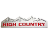 A silver 3D zinc alloy decal featuring a mountain range silhouette and the text HIGH COUNTRY in red.