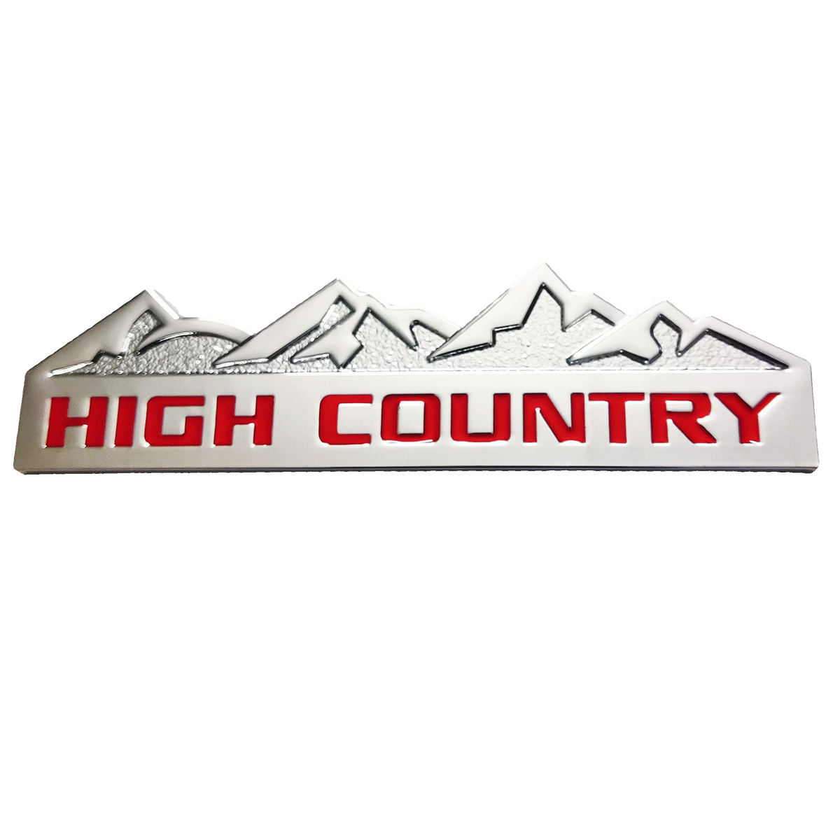 A silver 3D zinc alloy decal featuring a mountain range silhouette and the text HIGH COUNTRY in red.