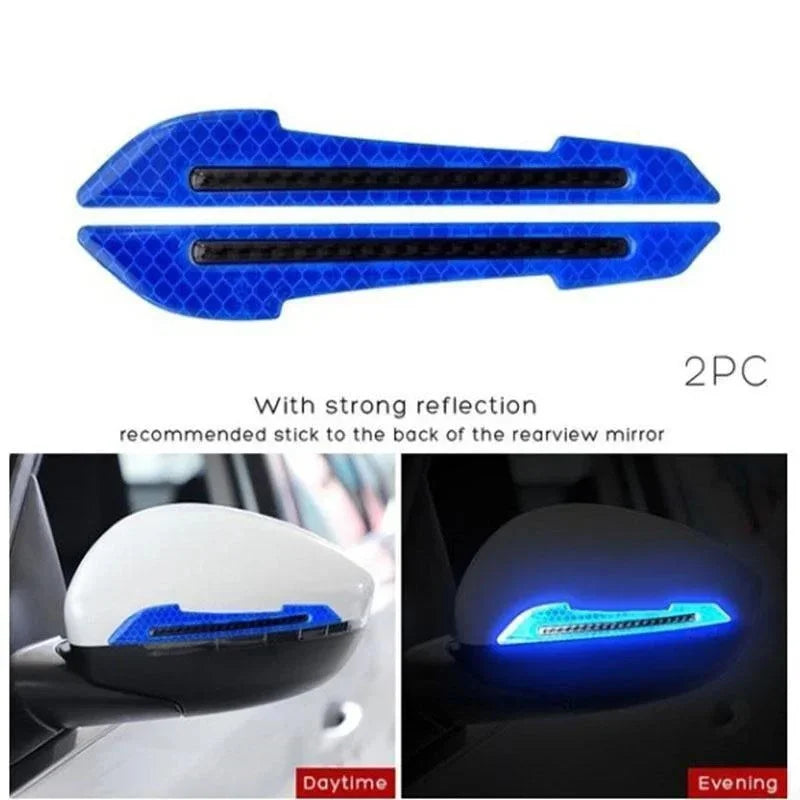 Two blue reflective strips recommended to stick to the back of a rearview mirror