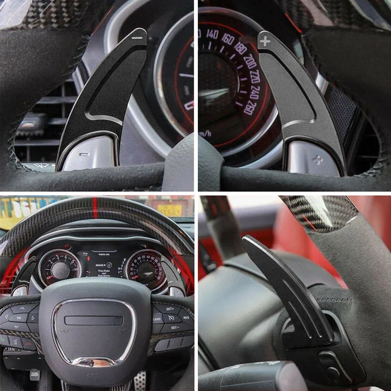 Close-up view of a CNC aluminum steering wheel paddle shifter and various automotive interior components.