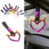 A collection of holographic heart-shaped car handle accessories in various colors and finishes.