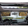 Interior view of a vehicle showing a tactical visor organizer with MOLLE pouches mounted on the roof and dashboard.