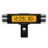 A black digital clock and thermometer with an orange display showing 12:09 and 30.4 degrees.