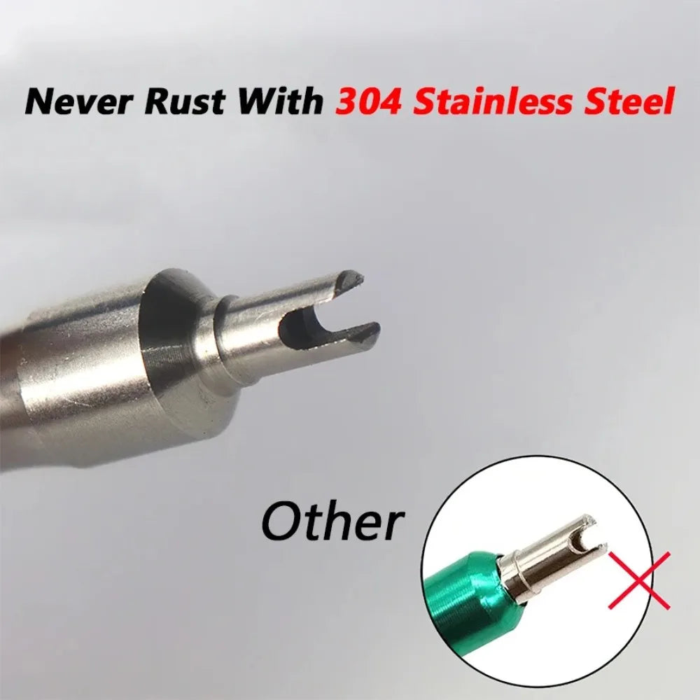 A close-up view of a metal tire valve core remover tool, demonstrating its design.
