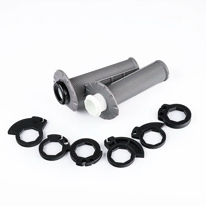 A set of universal motorcycle handlebar grips in gray and black.