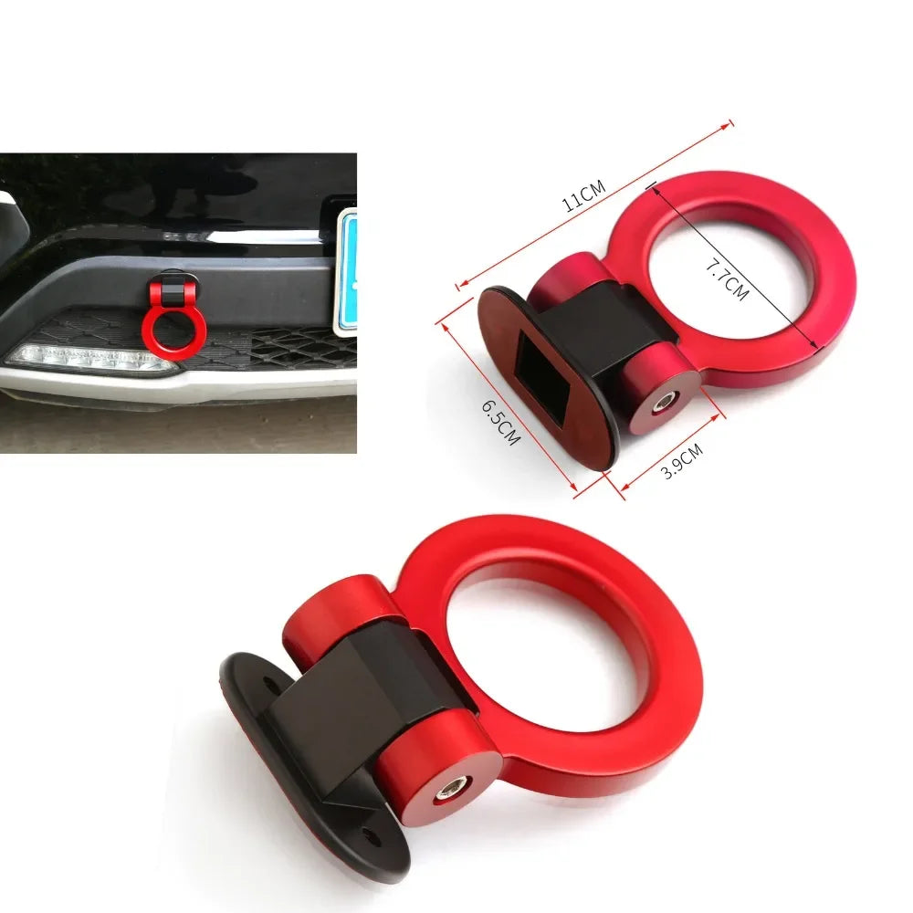 A set of red and black car trailer hook decals with various sizes shown against a black car surface.
