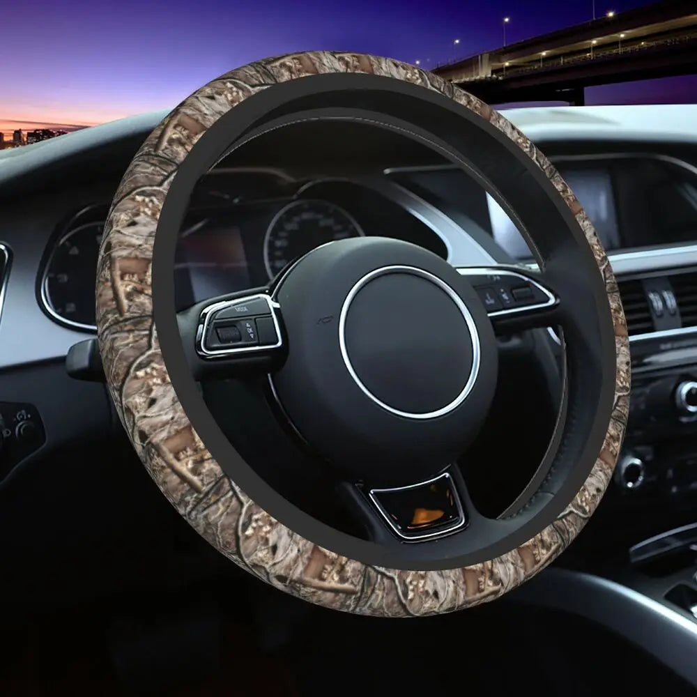 Steering wheel covered in camouflage patterned material inside a car