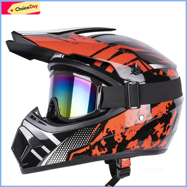An orange and black kids motorcycle off-road safety helmet with a clear visor.