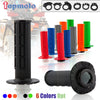 A collection of six colored gel rubber handlebar grips and a black grip mount shown next to a dirt bike background.