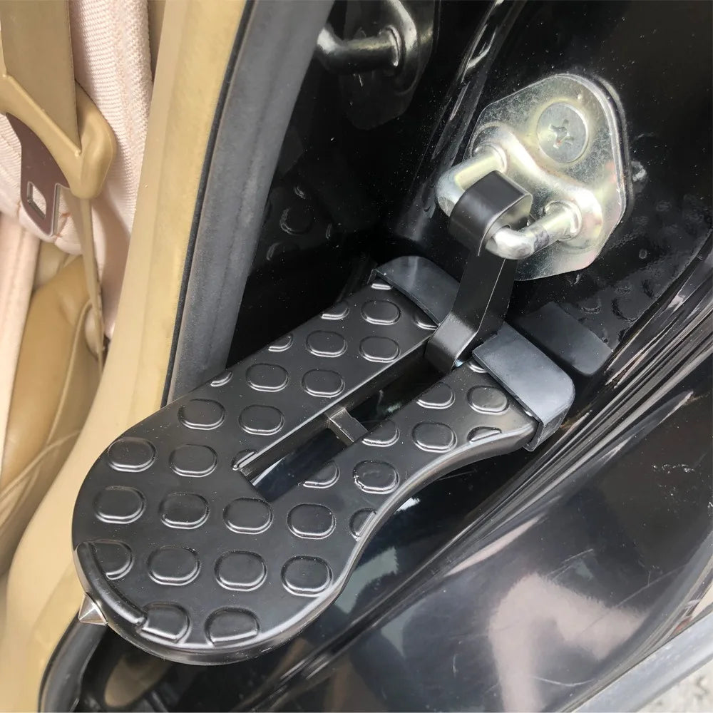 A heavy-duty vehicle roof access hook is shown attached to a black car, featuring a textured grip and metal latch.
