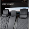 Interior view of a car seat showing memory foam headrests with leather covers.