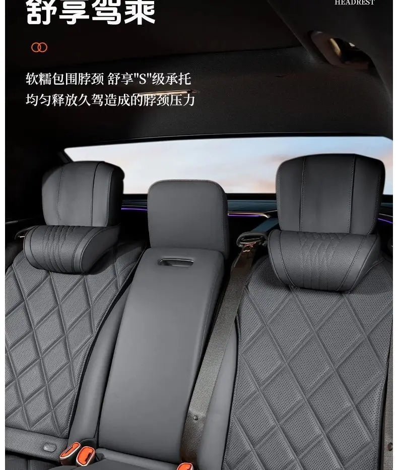 Interior view of a car seat showing memory foam headrests with leather covers.