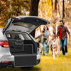 A white SUV's trunk is open showing a black waterproof pet trunk liner installed.