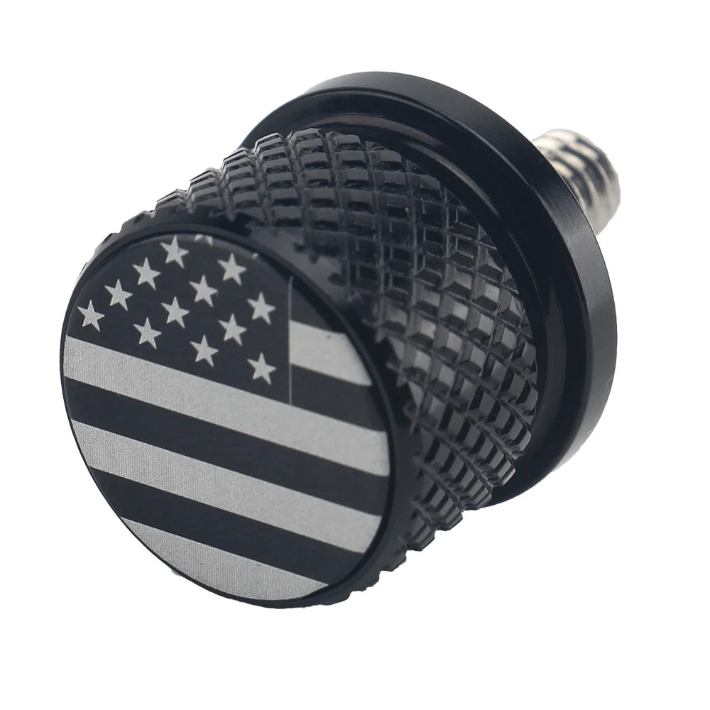 Black aftermarket motorcycle seat and fender bolts with a patriotic design