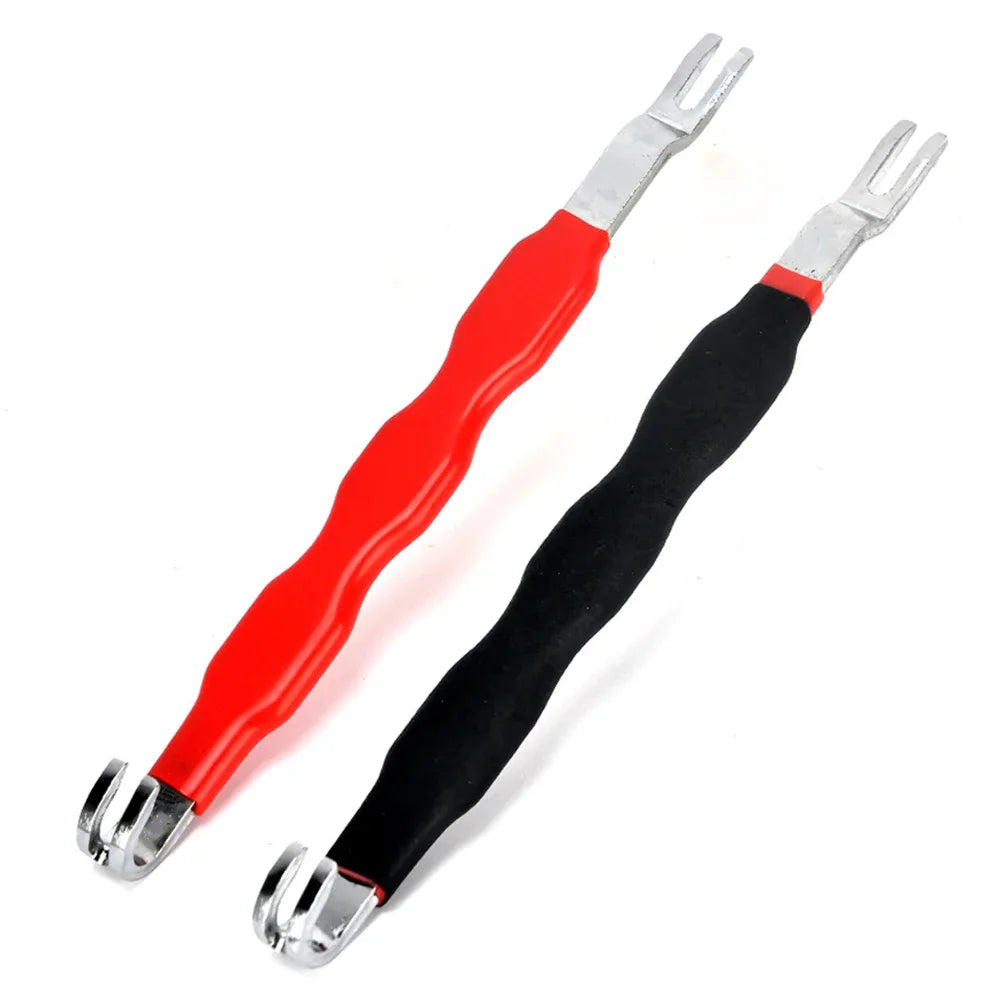 Un par de herramientas para retirar conectores eléctricos automotrices rojos y negros.