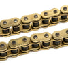 Close-up view of a heavy-duty motorcycle chain with brass links and black o-rings.