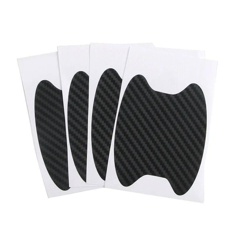 A set of five black carbon fiber door handle protection films laid out on a white background.