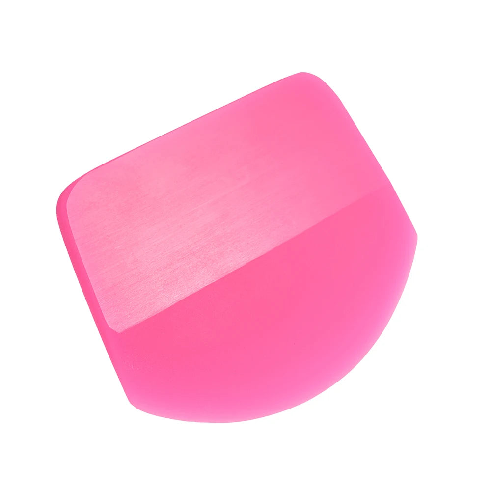 A pink anti-scratch PPF squeegee tool used for window tinting and film installation.