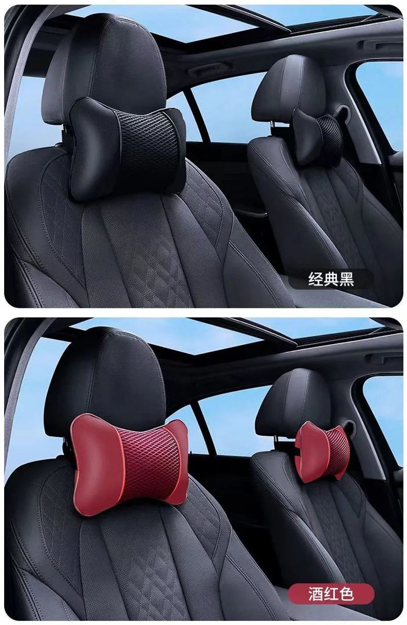 Close-up view of black and red universal car headrest pillows for neck comfort in a vehicle interior.