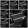 Black leather car console covers with diamond grid patterns and decorative stitching.