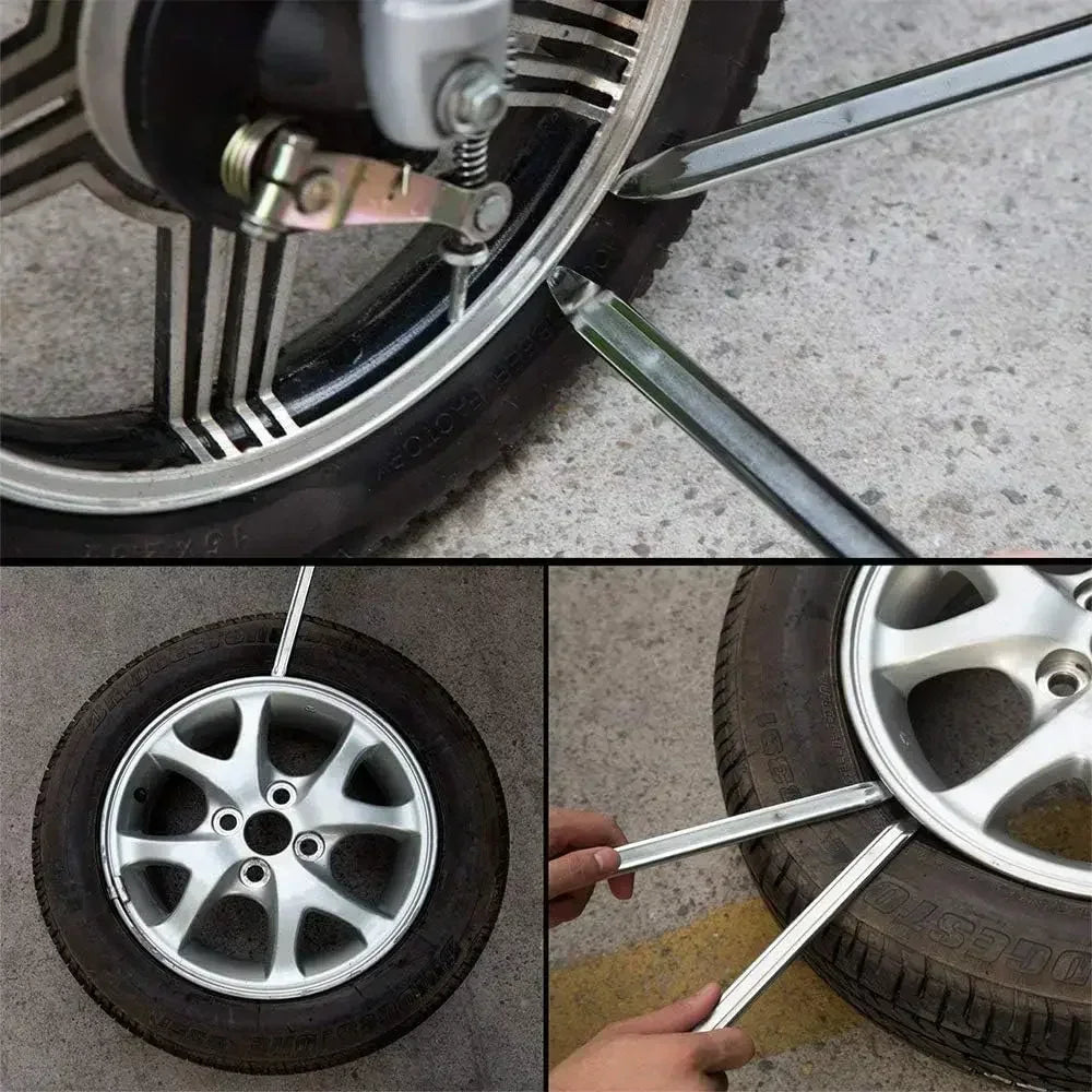 A set of heavy-duty tire wrenches and rim openers being used to remove a tire from a wheel.
