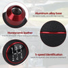 Close-up view of a red aluminum alloy gear shift knob with honeycomb leather and 5-speed identification markings