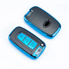 A blue and black universal car key case cover for multiple models shown from above.
