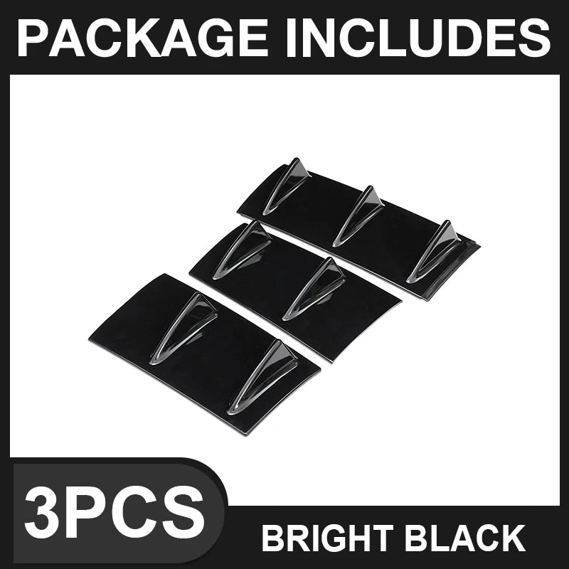 Three glossy black rear bumper lip diffusers are shown against a white background.