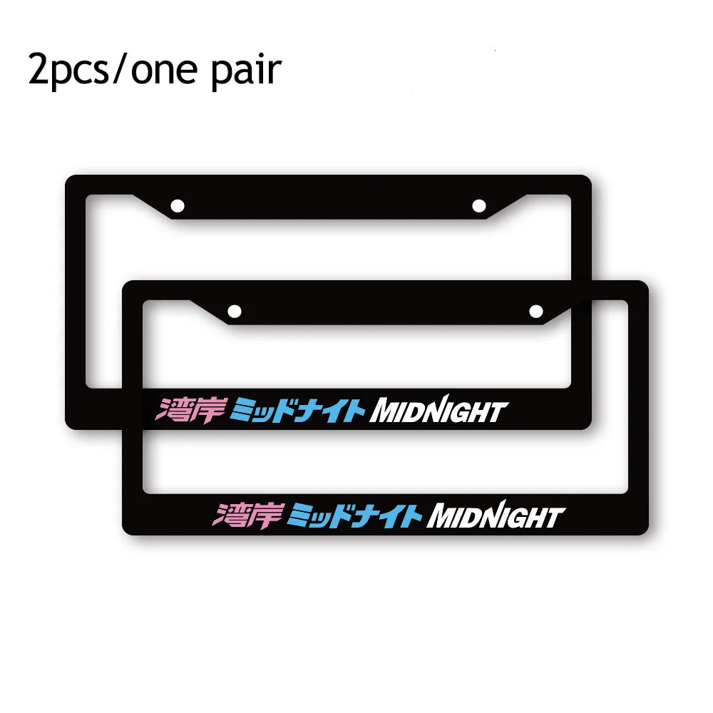 Two black license plate frame decorations with white text Midnight
