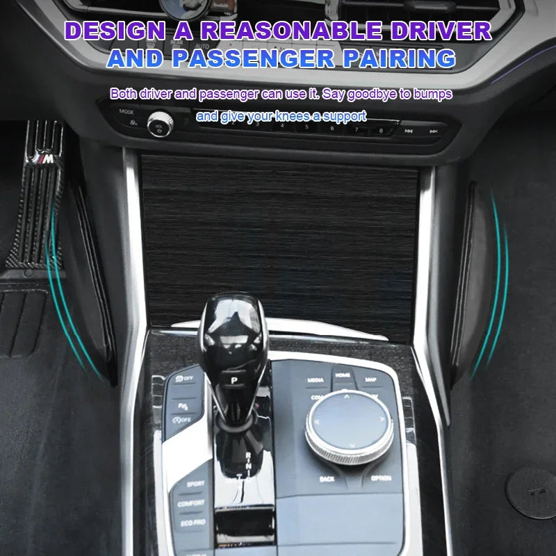 A close-up view of a car interior showing knee pads designed for driver and passenger support.