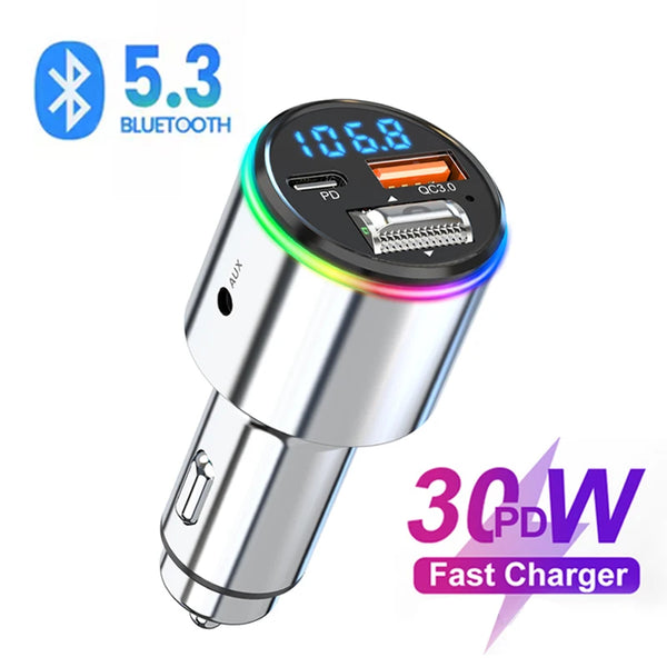 A silver Bluetooth FM transmitter device showing a display of 106.8 and 30W PD fast charging capability.