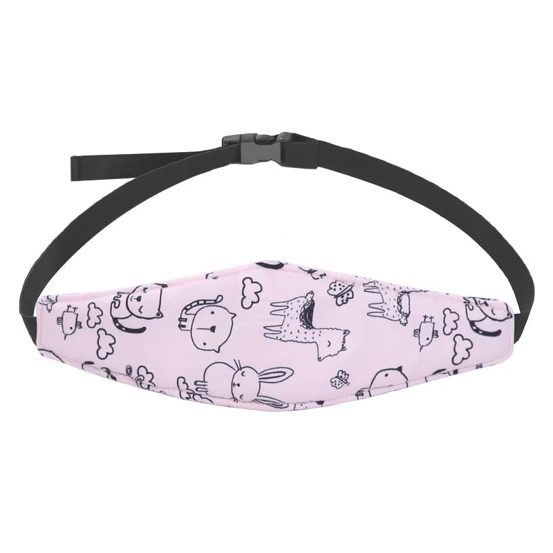 Pink gemusterte Kopfstütz-Kissen für Babyautositze mit schwarzem Riemen.