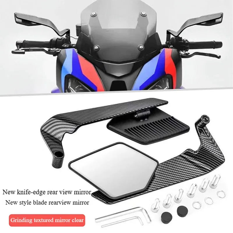 A set of adjustable motorcycle side mirrors and a new knife-edge rear view mirror with a textured glass surface.