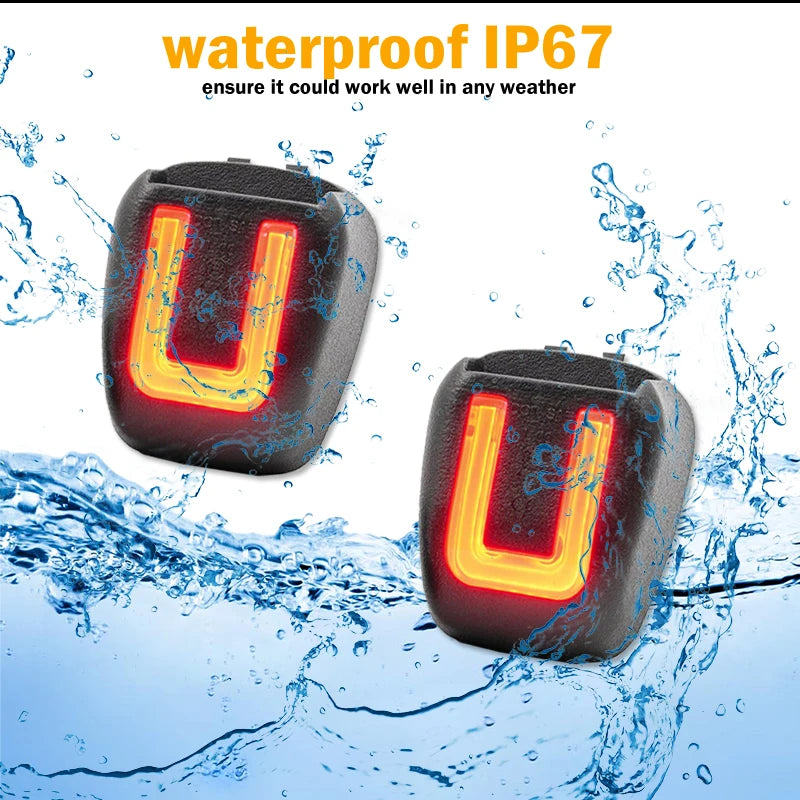 A waterproof LED license plate light with the letter U is shown being splashed by water.