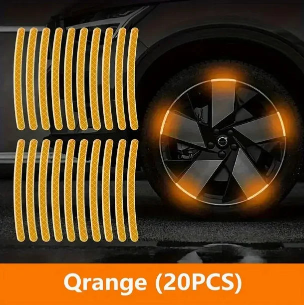 Twenty yellow reflective wheel hub decals arranged in two rows against a dark car wheel background.