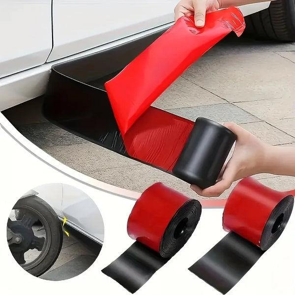 A hand is applying a red and black self-adhesive PVC car side protection strip to the exterior of a vehicle's door frame.